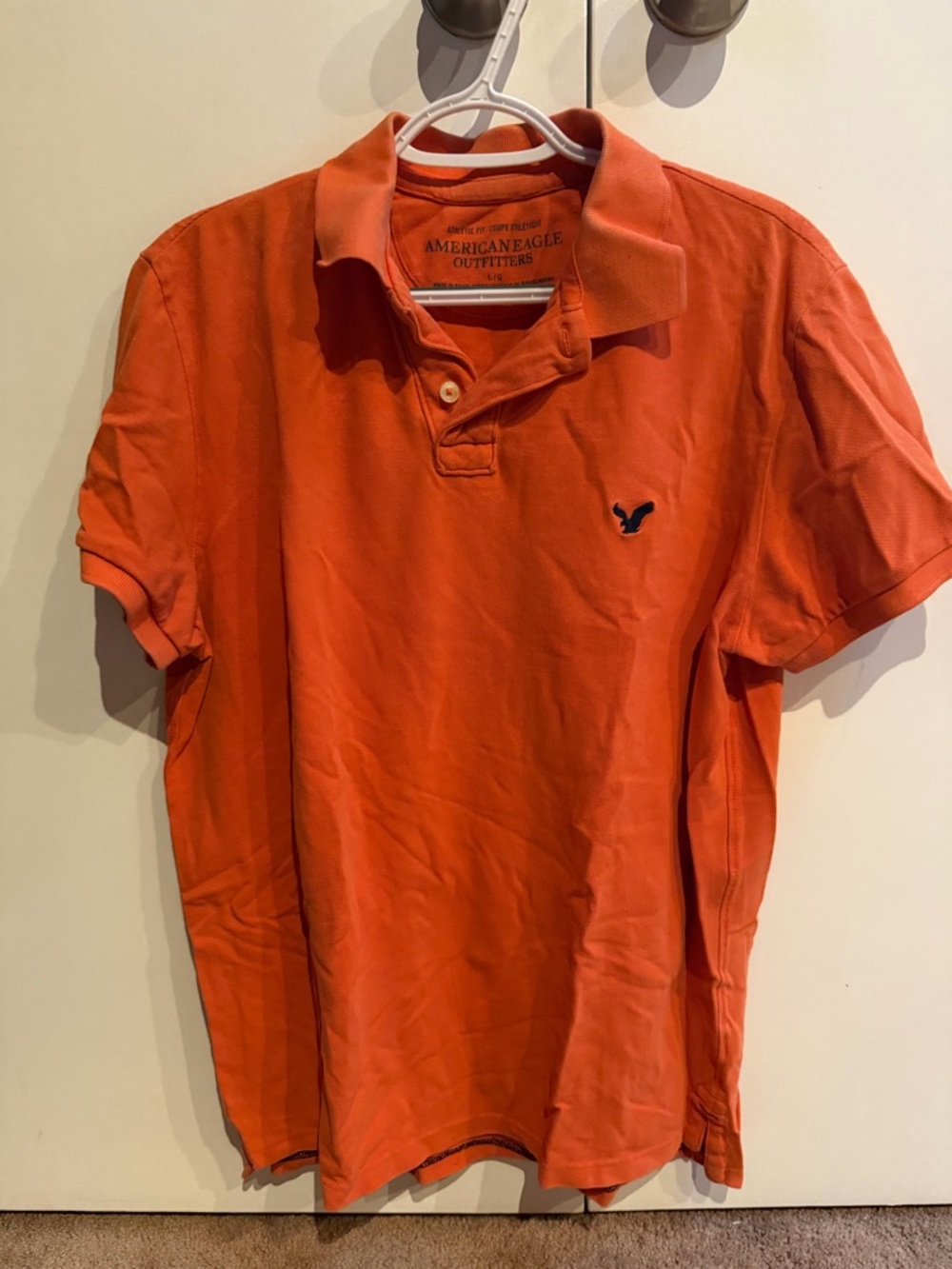 American Eagle Outfitters Orange Polo with Navy Logo